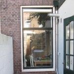 nieuw isolatieglas in nieuw kozijn bij oude huizen