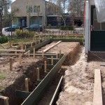 plaatsen van een bekisting voor de fundering